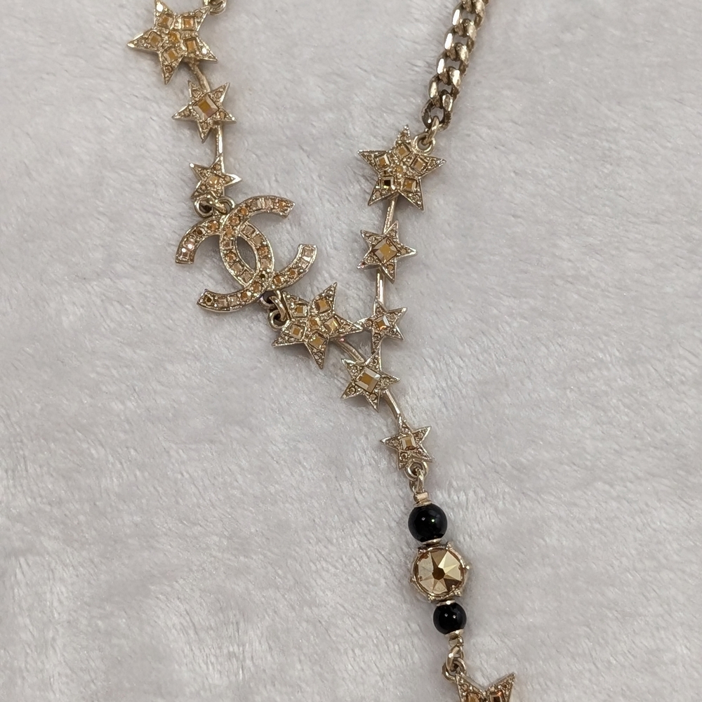 Gold and Black Star Necklace